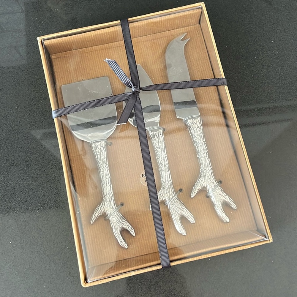 Pottery Barn • cheese knives